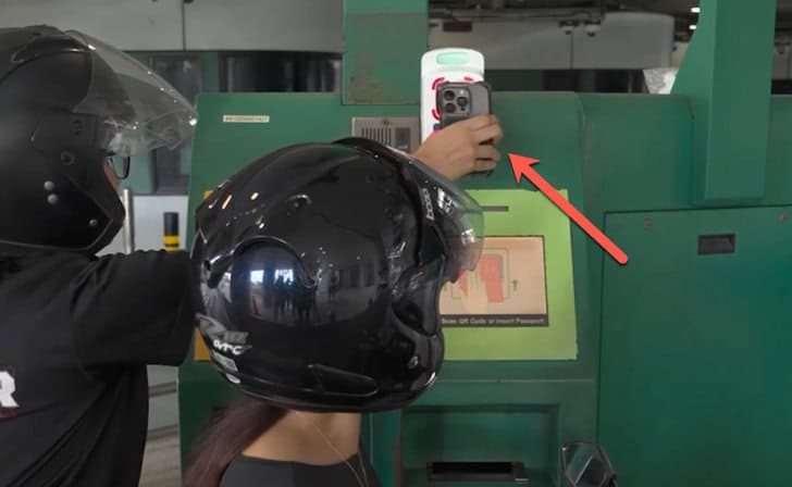 Scan QR Code at the first barrier of QR Code Checkpoint