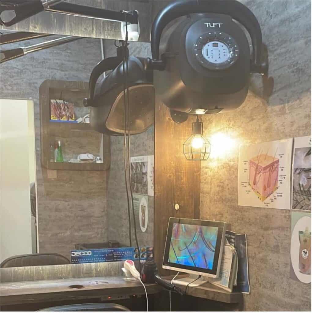 An example of the monitor & scalp scanner used by Hairfun Pte. Ltd. (Source: CCCS)
